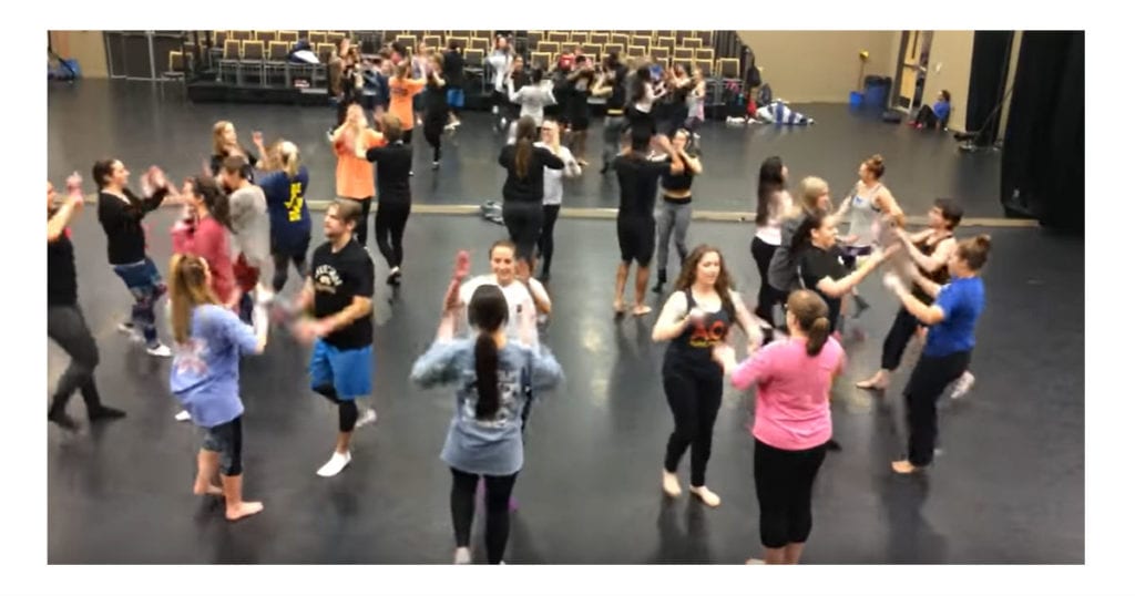Group of dancers sit in a circle – tackle ‘impossible’ body percussion ...