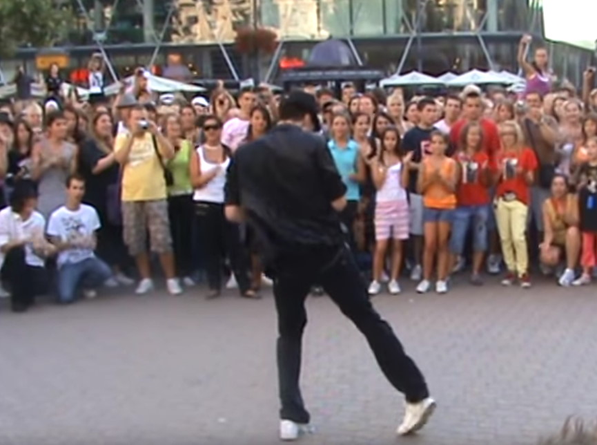 Large Crowd Gathers For Young Man’s Michael Jackson Impersonation