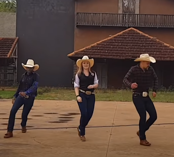Brazilian line dancers show us how to country dance