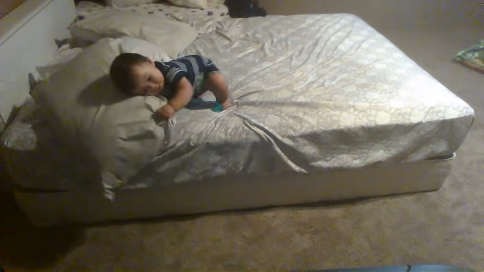 Smart baby hatches brilliant plan to safely get out of bed