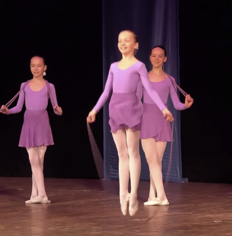 Jump Rop Dance 12 young girls perform an intricate dance routine involving…jump ropes?