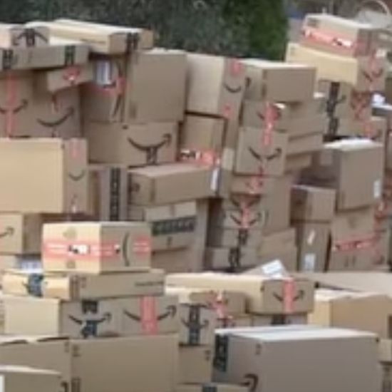 Worried neighbors confused as thousands of Amazon boxes pile up outside