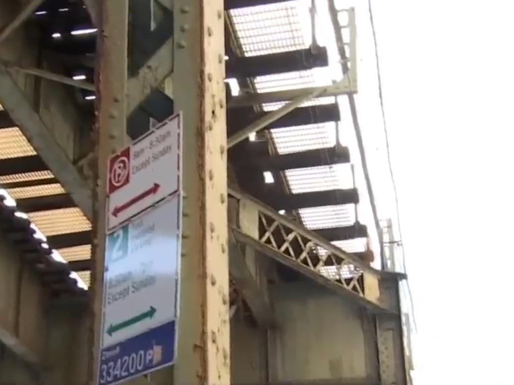 Man leaps from subway tracks onto building rooftop in daring attempt to ...