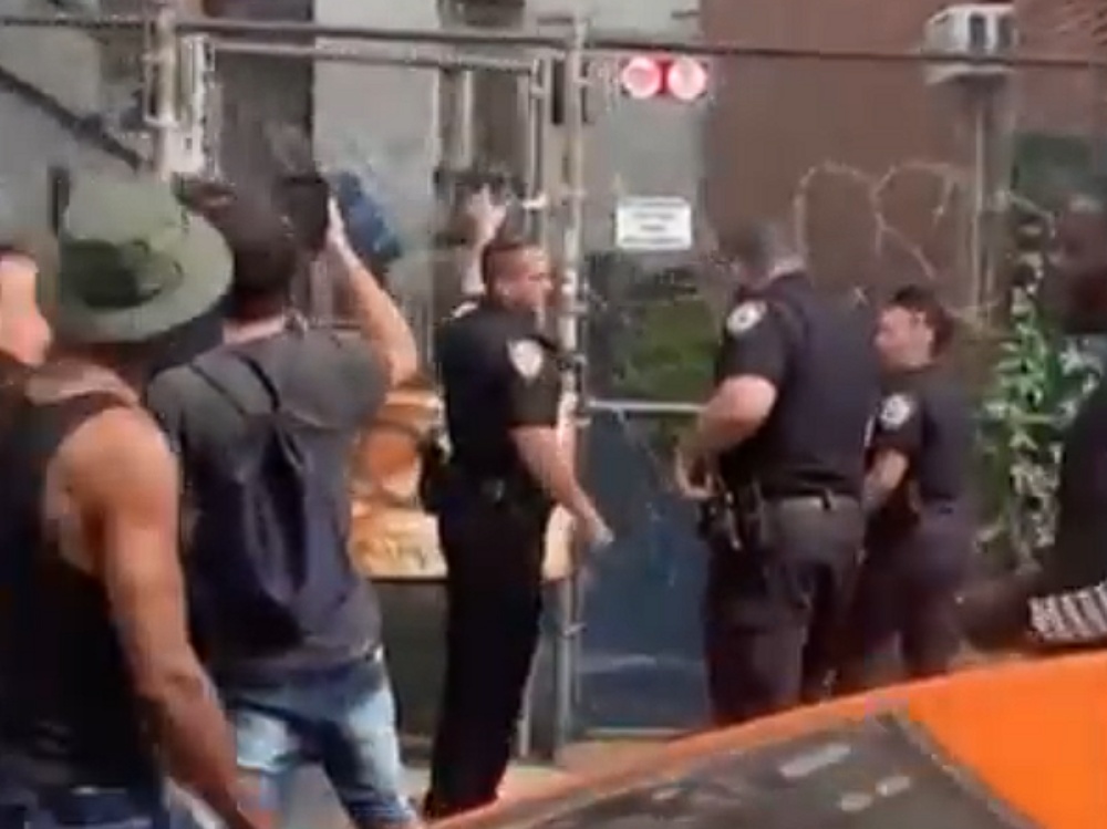Man leaps from subway tracks onto building rooftop in daring attempt to ...