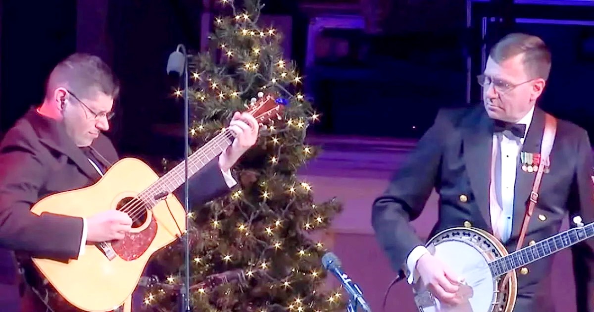 Two Navy officers duel it out to “Jingle Bells” giving the crowd a show